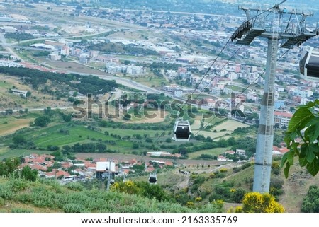 Selective Focus Touristic Cable Car Around  Pergamon Acropolis in Teleferik, Bergama, Turkey. 