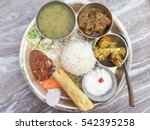 Selective focus of Traditional Nepalese food - Fish Thali or Thakali (dal bhat) in a restaurant.  