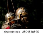 selective focus, two roman legionaries in an act of historical recreation on the roman era