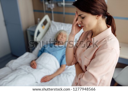 Similar – Female doctor comforting older female patient