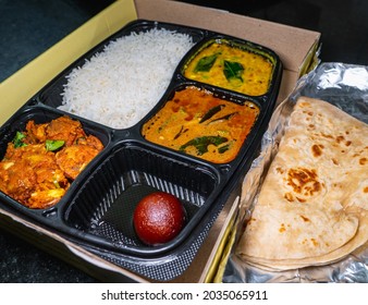 Selective Focus Of A Variety Of Indian Takeout Food.