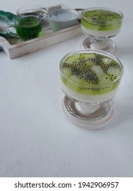 Selective Focus. A View Milk Pudding With Topping Nata De Coco, Basil Seeds And Melon Syrup.