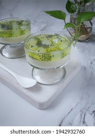 Selective Focus, A View Milk Pudding Served With Topping Nata De Coco, Basil Seeds And Melon Syrup.