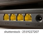 selective focus , WAN port cable and LAN ports connector on the back panel  Router or Wireless router 