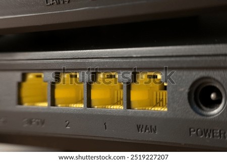 selective focus , WAN port cable and LAN ports connector on the back panel  Router or Wireless router 