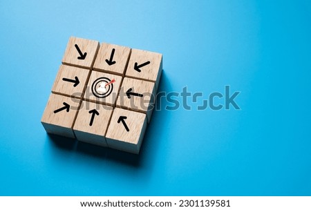 Selective focus at wood brick with icon of target customer with arrow pointing on target. SEO tools which can increase sale and revenue. Marketing icon concept on plain background with copy space.  商業照片 © 