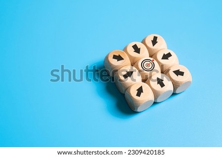 Selective focus at wood brick with icon of target customer with arrow pointing on target. SEO tools which can increase sale and revenue. Marketing icon concept on plain background with copy space. 商業照片 © 