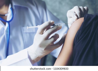 Selective Focus,Doctor Inject Vaccine To Patient.