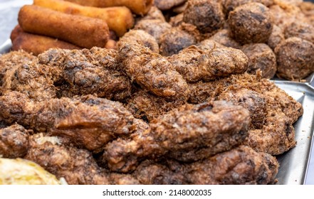 Selective Focused Delicious Fried Cookies And Grilled Chicken Meat Close Up Shot On A Street Market