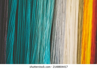 Selective focused left Yarn dyed thread cord packthread color hang the wall for background usage 