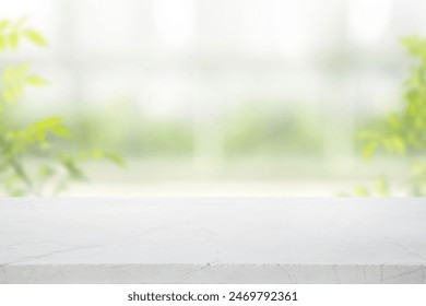 Selective focus.Elegance product display background with marble top on blur big window and fresh garden.copy space - Powered by Shutterstock