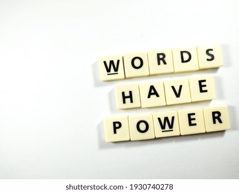 Selective Focus.Scrabble Letters With Text WORDS HAVE POWER On White Background.