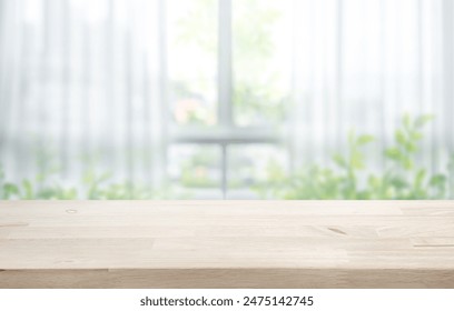 Selective focus.Wood table counter on blur curtain window in fresh morning background.copy space design - Powered by Shutterstock