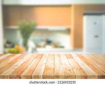 Selective Focus.Wood Table Top On Blur Kitchen Counter Background.For Montage Product Display Or Design Key Visual Layout.