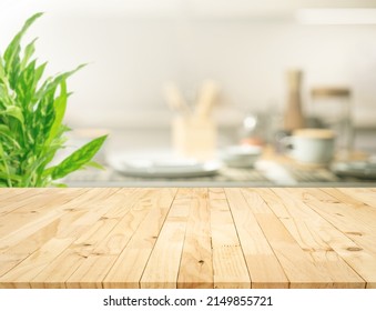 Selective Focus.Wood Table Top On Blur Kitchen Counter Background.For Montage Product Display Or Design Key Visual Layout.