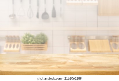 Selective Focus.Wood Table Top On Blur Kitchen Counter Background.For Montage Product Display Or Design Key Visual Layout.