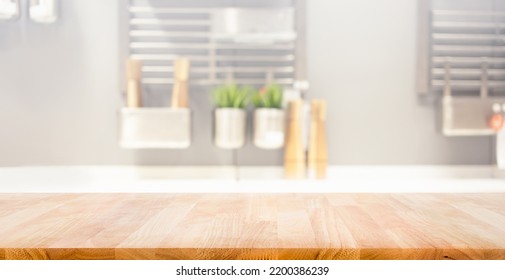 Selective Focus.Wood Table Top On Blur Kitchen Counter Background.For Montage Product Display Or Design Key Visual Layout.