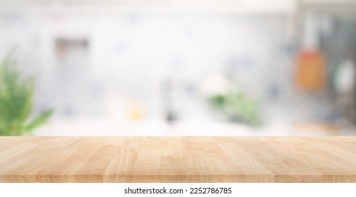 Selective focus.Wood table top on blur kitchen counter background.For montage product display or design key visual layout. - Shutterstock ID 2252786785