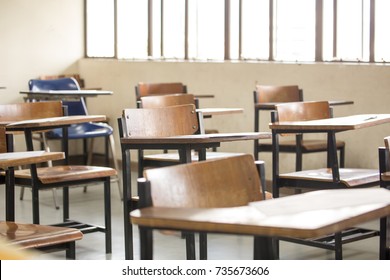 Selective Soft And Blur Focus.old Wooden Row Lecture Chairs In Classroom In Poor School.study Room Without Student.