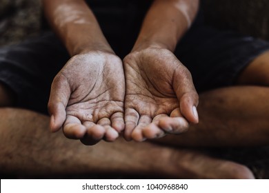 Selective soft focus. hands poor child begging you for help concept for poverty or hunger people, Human Rights,background text.