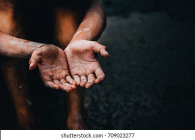 selective soft focus. hands poor child begging you for help concept for poverty or hunger people, Human Rights,background text.