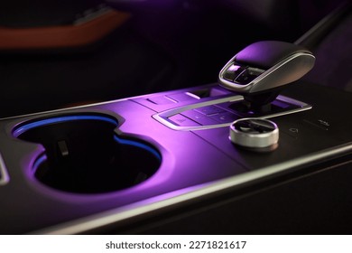 Selector automatic transmission with leather in the interior of a modern expensive car. The background is blurred. Black and brown leather car - Shutterstock ID 2271821617