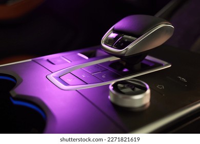 Selector automatic transmission with leather in the interior of a modern expensive car. The background is blurred. Black and brown leather car - Shutterstock ID 2271821619