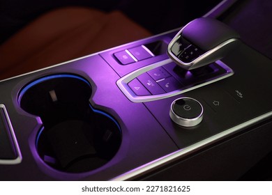 Selector automatic transmission with leather in the interior of a modern expensive car. The background is blurred. Black and brown leather car - Shutterstock ID 2271821625