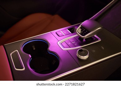 Selector automatic transmission with leather in the interior of a modern expensive car. The background is blurred. Black and brown leather car - Shutterstock ID 2271821627