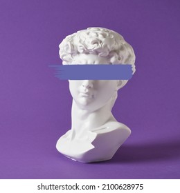selectve focus of  bust of david replica on a purple background copy space, a copy of the work of michelangelo, art with antique sculpture