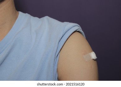 Selevted Focus To The Arm With A Cotton Swab Injected And Vaccinated.