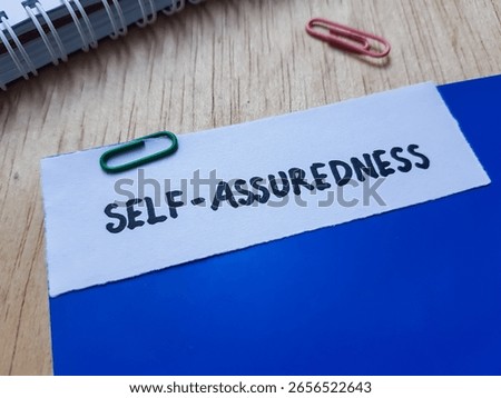 Self - assuredness writting on table background.