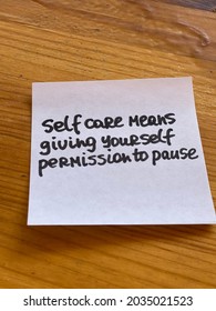 Self care means giving yourself permission to pause. Handwritten text.