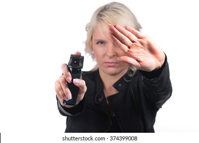 Self defense with pepper spray isolated