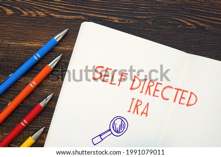  Self Directed IRA inscription on the piece of paper. 
