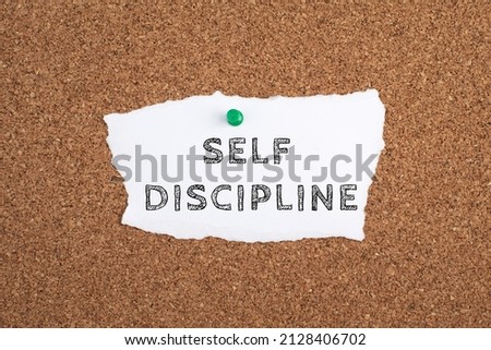 Self discipline is standing on a paper, improvement by education, willpower to reach goals