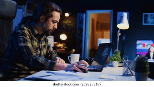 Self employed developer updating artificial intelligence machine learning algorithm, writing binary code scripts. IT expert working from home using programming to upgrade AI brain, camera B