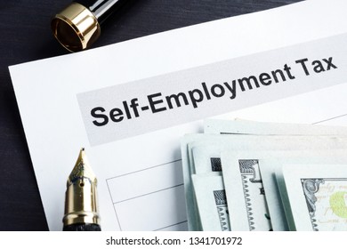 Self Employment Tax Form And Money With Calculator.