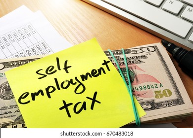 Self Employment Tax Written On A Memo Stick.