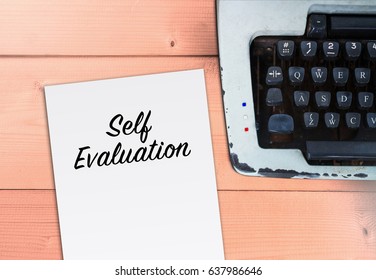 Self Evaluation On Paper With Typewriter On Wood Table