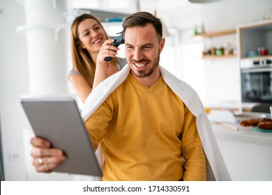 Self Hair Care During Quarantine. Couple Having Hair Cut At Home Isolation Coronavirus Pandemic