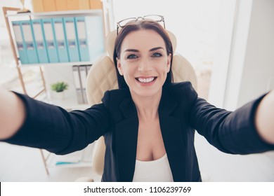 Self Portrait Of Cheerful Positive Woman With Glasses On Head Shooting Selfie On Front Camera With Two Hands Enjoying Break Having Fun Video Call With Friend