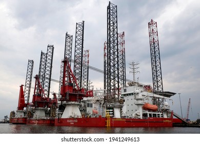 Self propelled jack-up barges in a port. These vessels are used for both the oil and gas industry as well as the installation of offshore wind parks