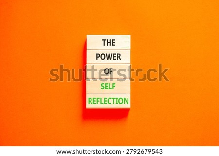 Self reflection symbol. Concept words The power of self reflection on beautiful wooden blocks. Beautiful orange paper background. Business the power of self reflection concept. Copy space.