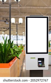 Self Service Electronic Counter With Blank Mockups On White Screen And Payment Terminal In Fast Food Restaurant, Shopping Mall