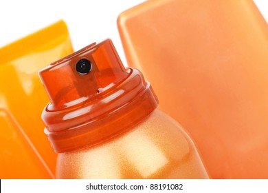 Self Tanning Spray And Tubes, Closeup On White