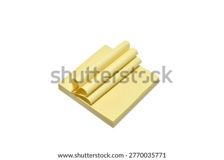 Self-adhesive square note pad with curled top sheets.