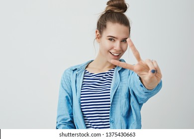 Self-assured Determined Woman Ready Achieve Goal Feeling Lucky Awesome, Unstoppable Desire Win, Confident Upbeat White Background, Extending Hand Showing Victory, Peace Gesture Smiling Daring