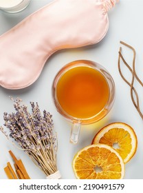Self-care flat lay with sleeping mask, lavender flower, herbal tea, dry oranges and aroma sticks on a blue background. Concept of Me time and no depression. Healthy sleep is healthy life - Shutterstock ID 2190491579