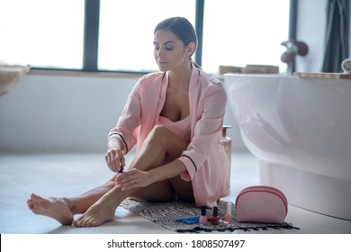 Selfcare. A Woman Taking Care Of Her Nails At Home